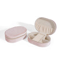 Oval velvet jewellery storage box in beige with flannel lining, showing 15cm by 10cm dimensions.