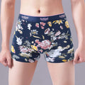 Men's floral print cotton boxer shorts with a U-shaped design, shown in extended sizes.
