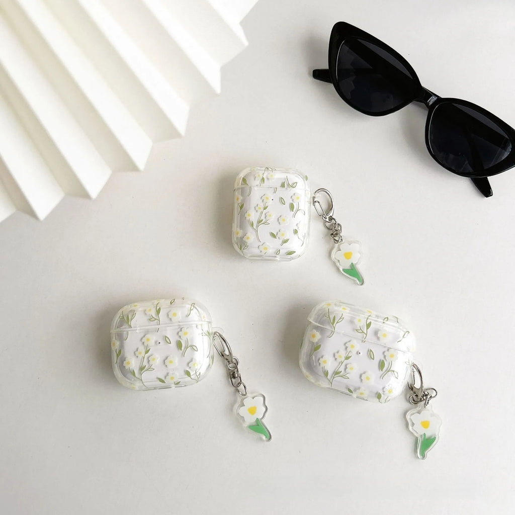 Clear TPU AirPods protective case cover with white floral design on transparent background