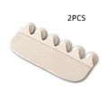 White PVC urine blocking board for children's toilet training placed on standard toilet seat