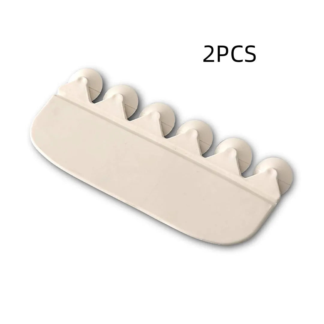 White PVC urine blocking board for children's toilet training placed on standard toilet seat