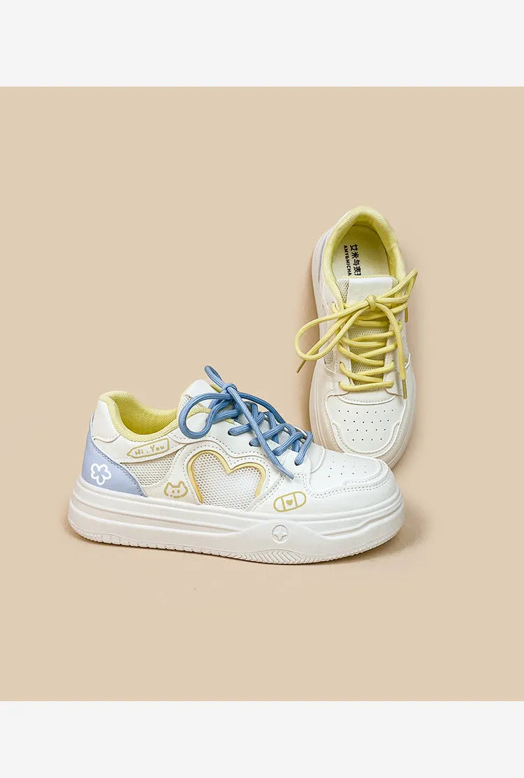 Women's mesh casual sneakers in Meow Rabbit Sea Salt Cheese colour with cross straps and rubber sole