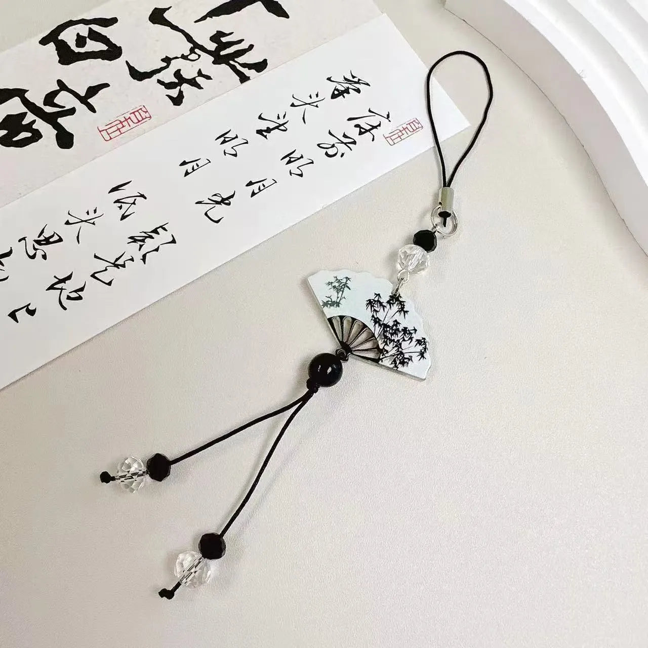 Guofeng Chinese style beaded keychain with Fan or Poetry pattern design for bag decoration.