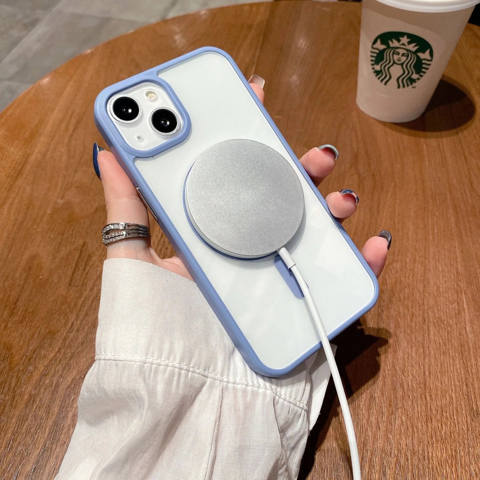Transparent MagSafe iPhone case showing magnetic ring compatibility in blue colour option