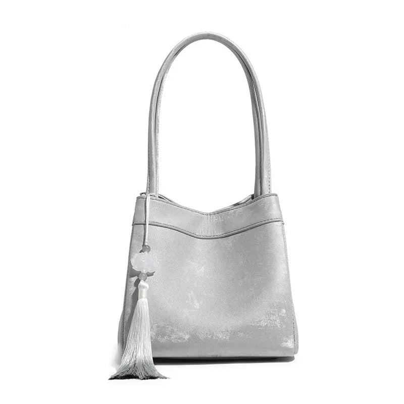 Portable shoulder crossbody bag in black PU leather with open pocket outer and sewing thread detail