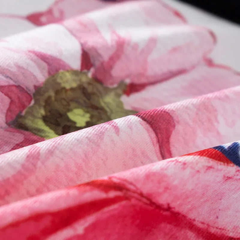 Men's printed ice silk boxer shorts showing floral pattern on breathable polyester fabric with mid waist design.