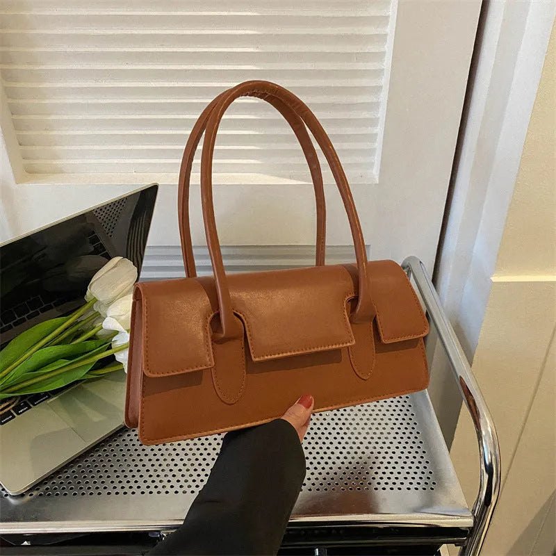 Women's retro small square bag in PU material with single shoulder strap and stitching details available in multiple colours