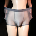 Men's light grey ice silk boxer underwear laid flat, showing ultra-thin nylon fabric.