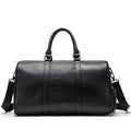 Men's black leather excursion bag with single shoulder strap showing large capacity design