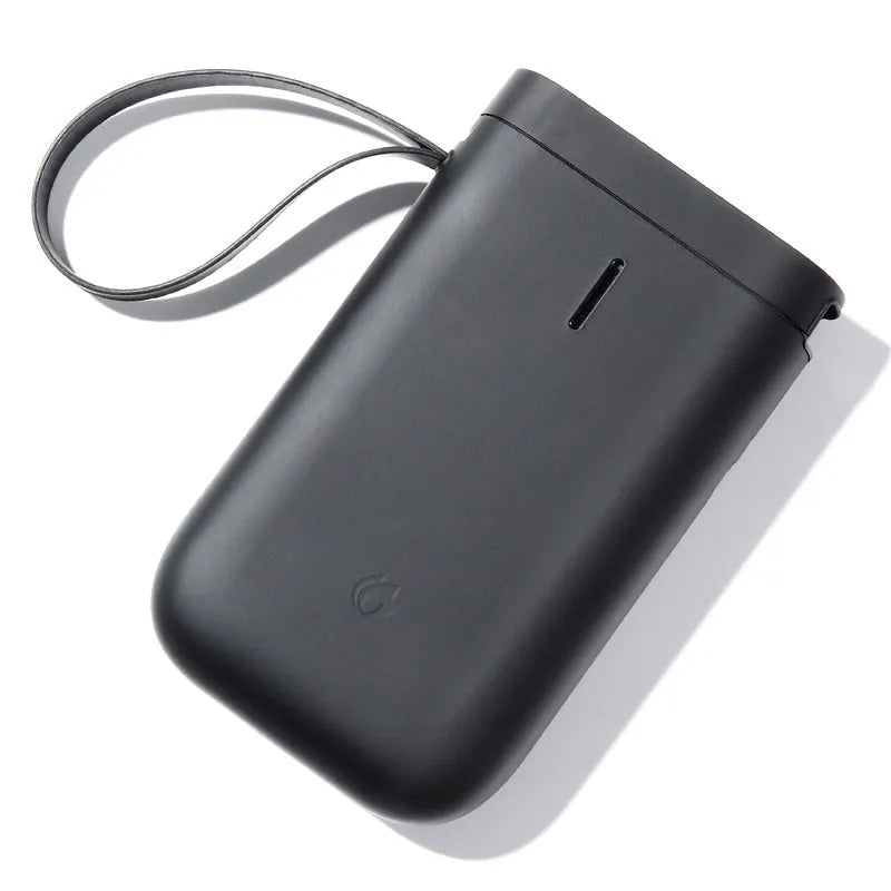 D11 Bluetooth thermal label printer in black, compact 108x76x30mm, with label paper roll