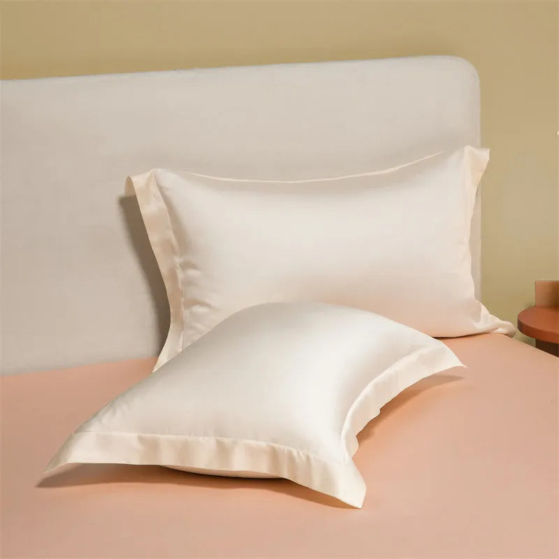 Luxury Lenzing Tencel duvet cover and pillowcase set in Aurora Blue colour on a modern bed.