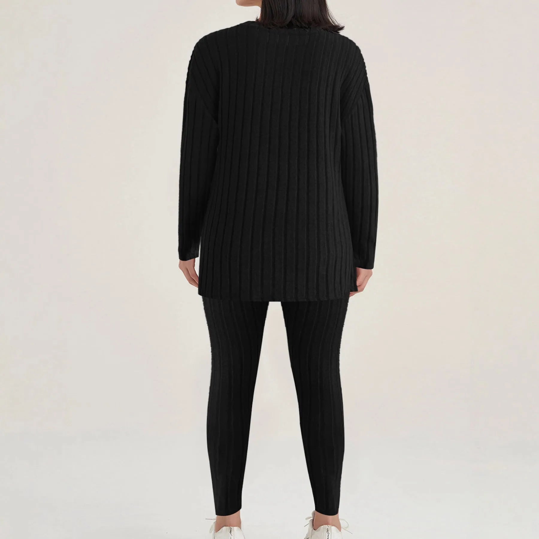 Black sunken stripe two-piece polyester homewear set with regular sleeves, showing top and pants.