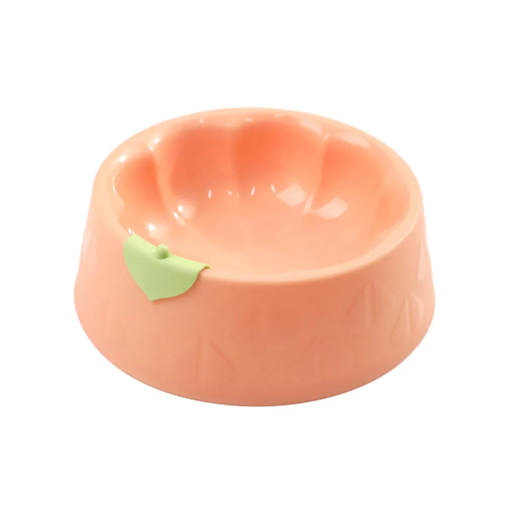 Green plastic double pet bowl with flower-shaped design and anti-tip base for cats and small dogs.