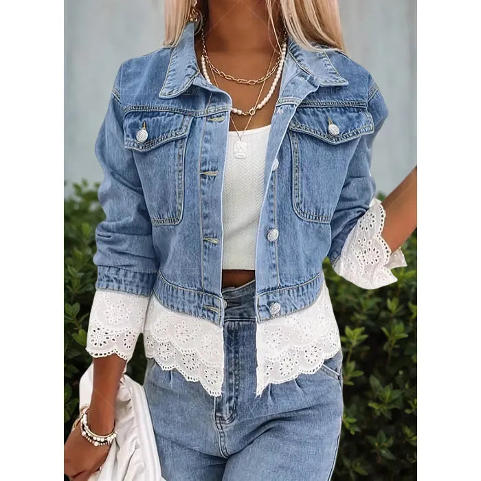 Blue women's denim jacket with white lace stitching detail on the front and sleeves.