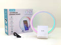 White smart Bluetooth speaker with wireless charging pad and ambient light ring