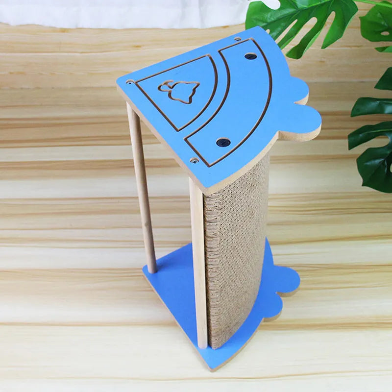Corner-mounted cat scratching pad with hanging ball attachment for furniture protection