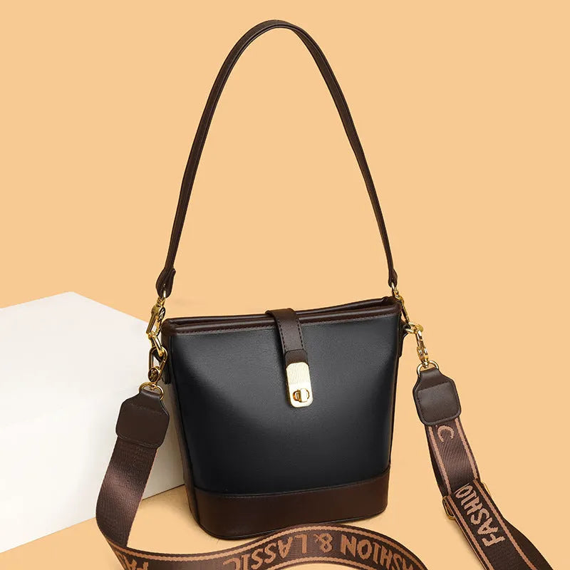Korean style black bucket shoulder bag with adjustable straps and organised interior compartments