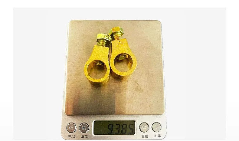 Pure copper car battery terminal clamp or connector on a white background.