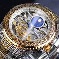 Forsining yellow stainless steel skeleton automatic mechanical watch showing carved tourbillon movement