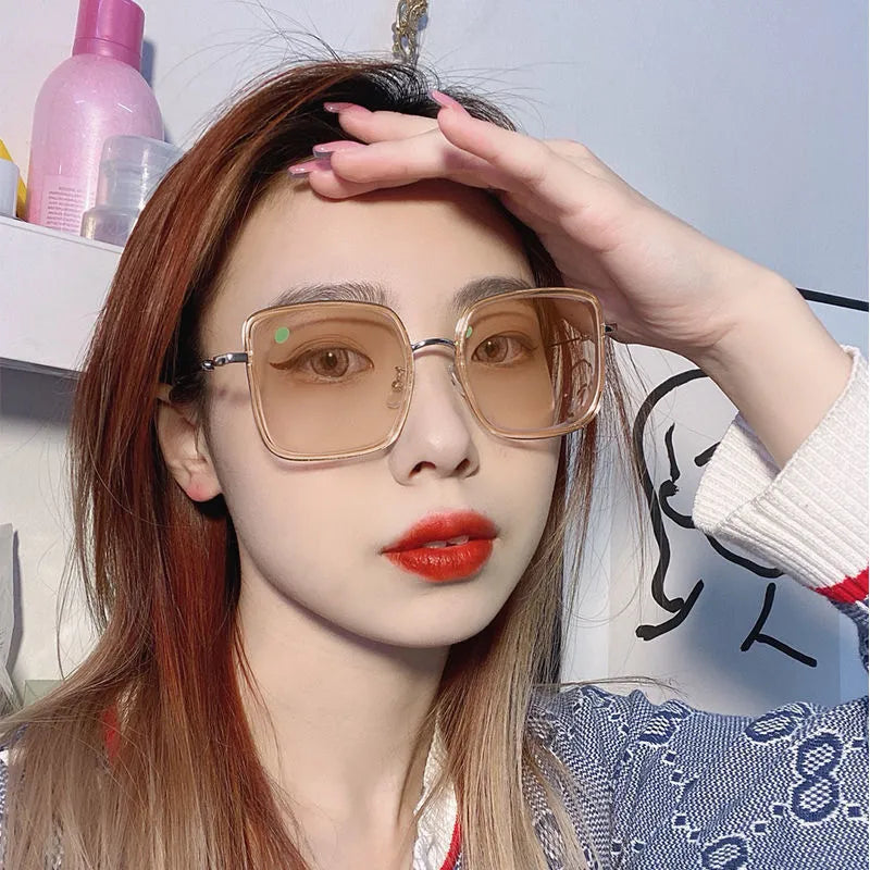 Photochromic myopia glasses with large frame, anti-blue light lens, and Black Gold frame colour options