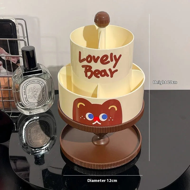 Rotating beige cosmetic brush storage barrel with 18-litre capacity on a table.