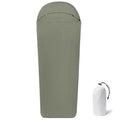 Blue lightweight mummy-style nylon sleeping bag with tapered foot, shown rolled up for travel.
