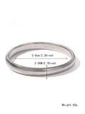 Women's titanium steel elastic bracelet with vertical stripe pattern in gold or silver, shown in various width sizes