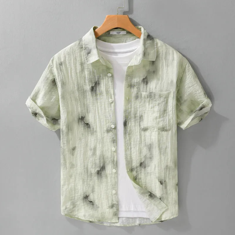 Linen blend printed short sleeve shirt cardigan in light green floral pattern, loose fit, on a female model