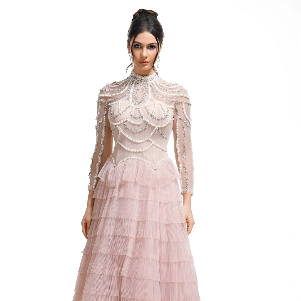 Women's black beaded long sleeve dress with mid-waist design and full-length skirt