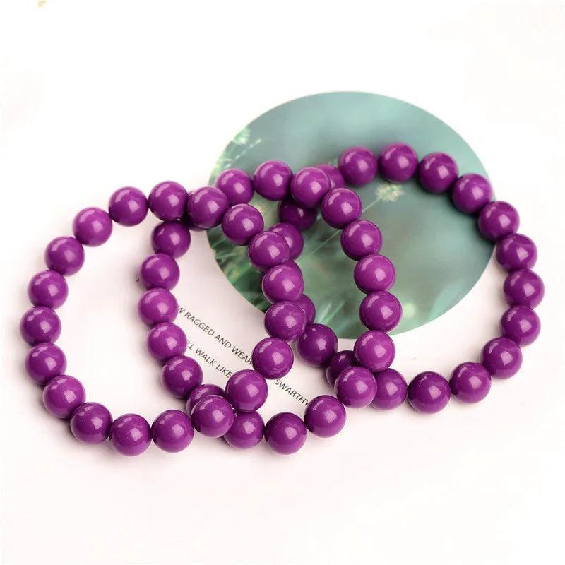 Jiuya polished crystal women's bracelet in 5A colour on a wrist, showing single circle bead design.