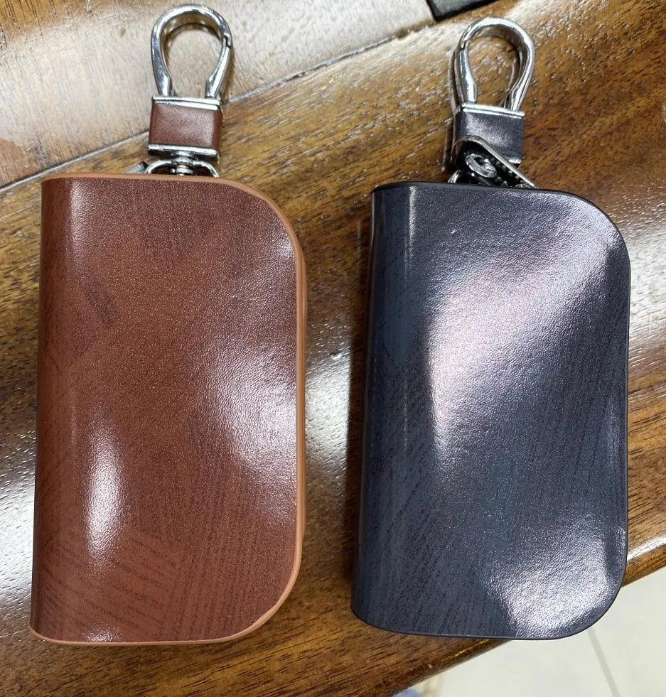 Genuine leather car key case with frosted finish and zipper closure