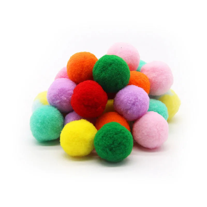 Plush pet toy gun with colourful yarn balls for interactive cat and dog play sessions