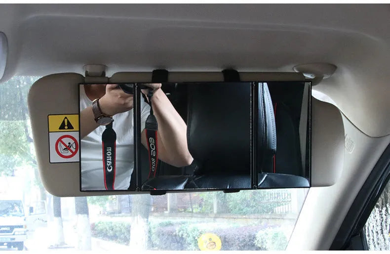 Silver folding car visor mirror shown closed and opened on a car sun visor.