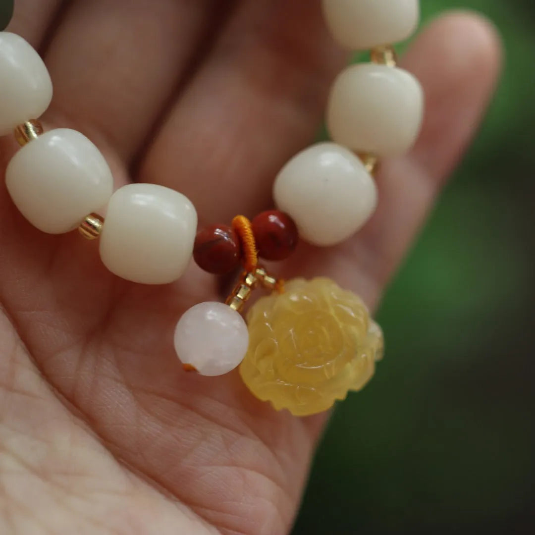 White jade gradient bodhi root bracelet with 10mm floral beads and beeswax lotus decorations