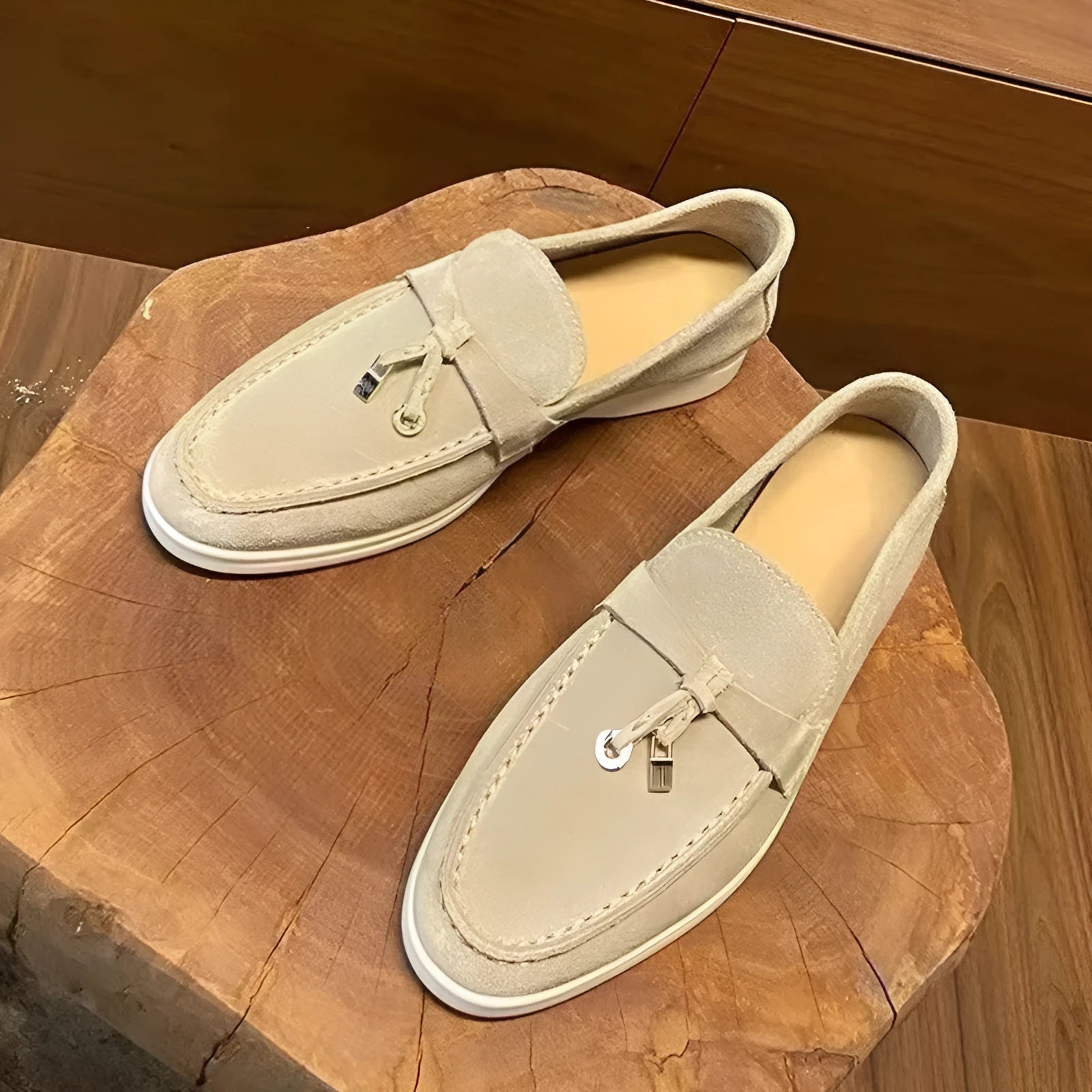 High top slip-on loafers with round toe cap and visible stitching on artificial PU upper