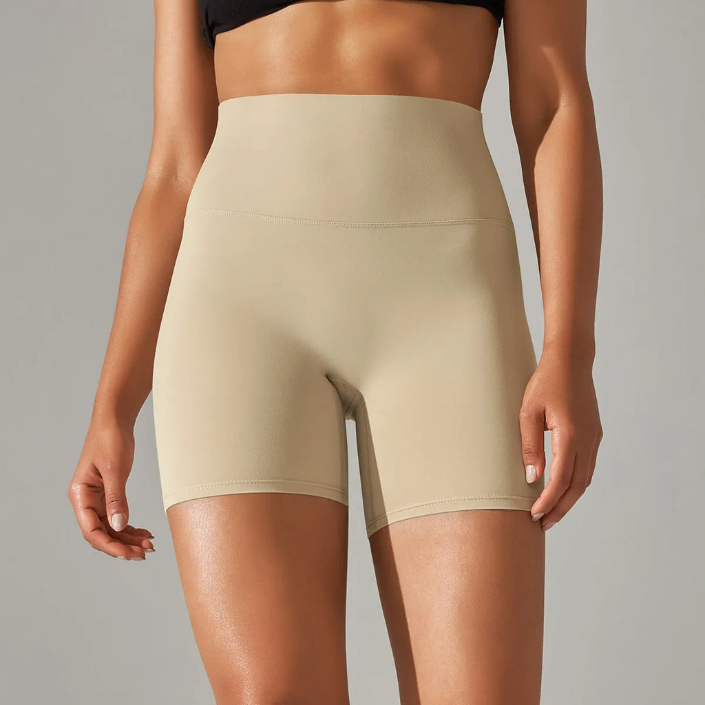 Women's high waist fitness pants in dark green with belly contracting design for sports and daily wear