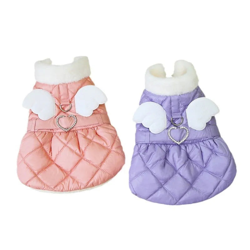 Small dog wearing pink thickened cotton skirt with casual angel-style design
