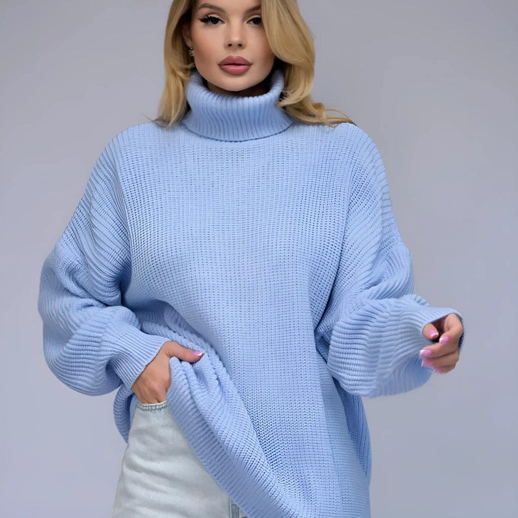 Women's high neck pullover sweater in thick imitation cashmere fabric with a 3D pattern, shown in sky blue.
