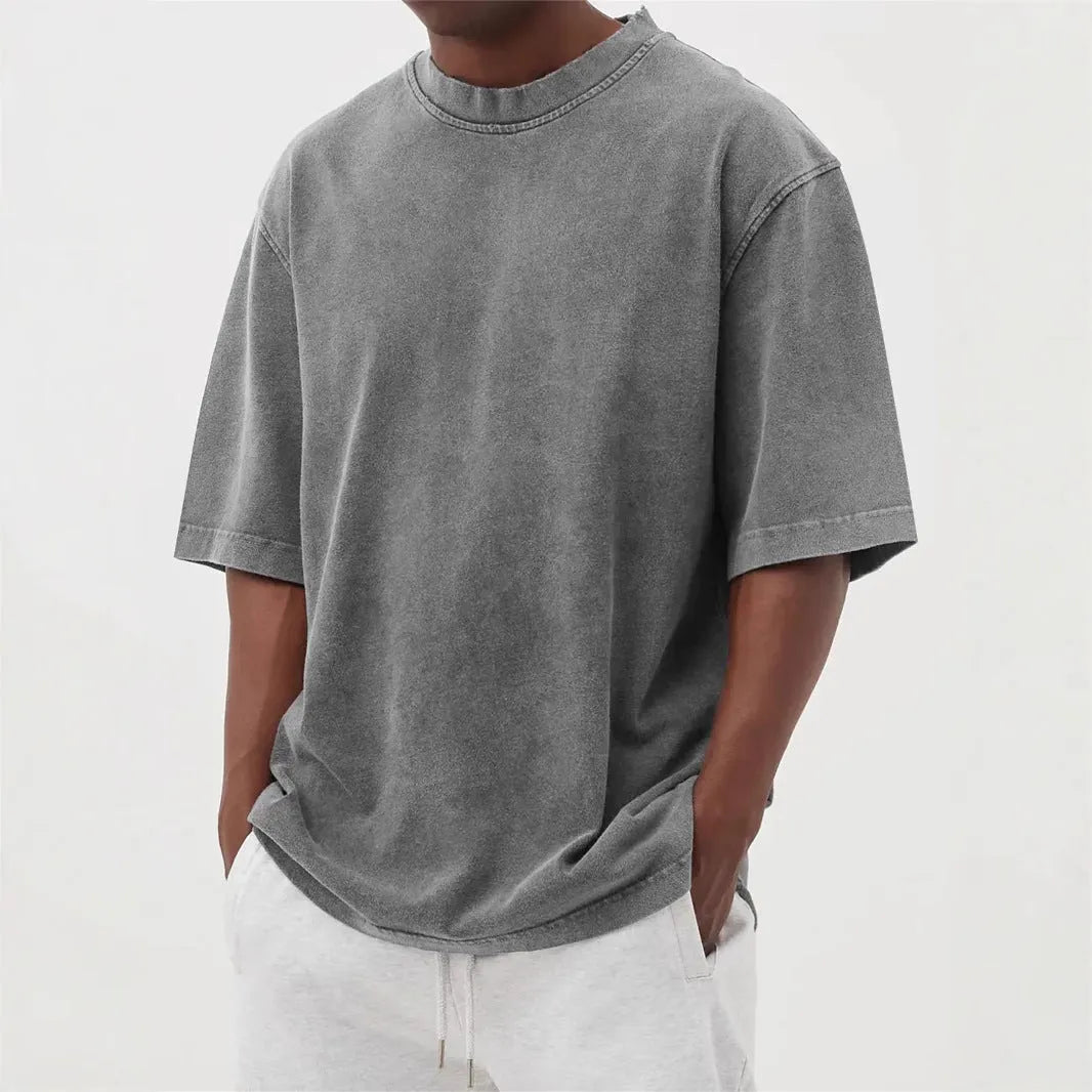 Men's loose-fitting distressed polyester t-shirt in solid colours with half sleeves