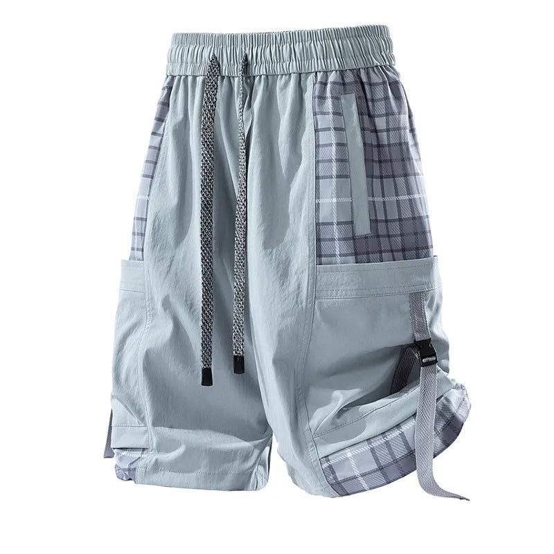 Men's black cargo shorts with plaid stitching pattern, loose fit design, and cargo pockets