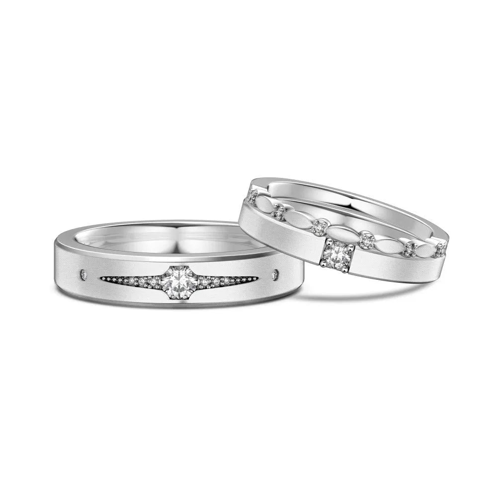 Sterling silver couple ring with geometric round diamond inlay in white gold finish on neutral background