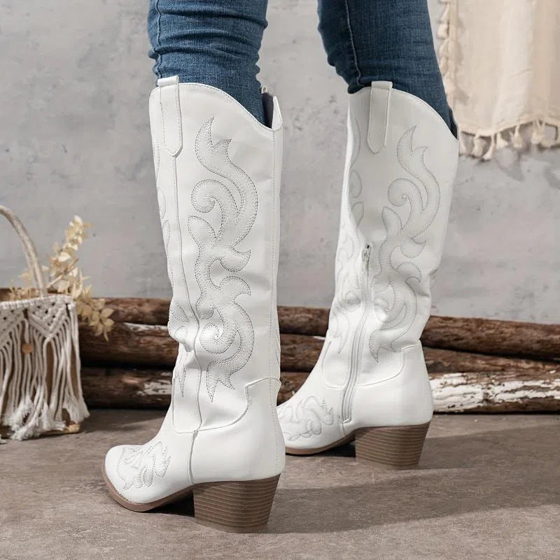 Women's embroidered denim over-the-knee boots with satin upper, round toe, medium heel.