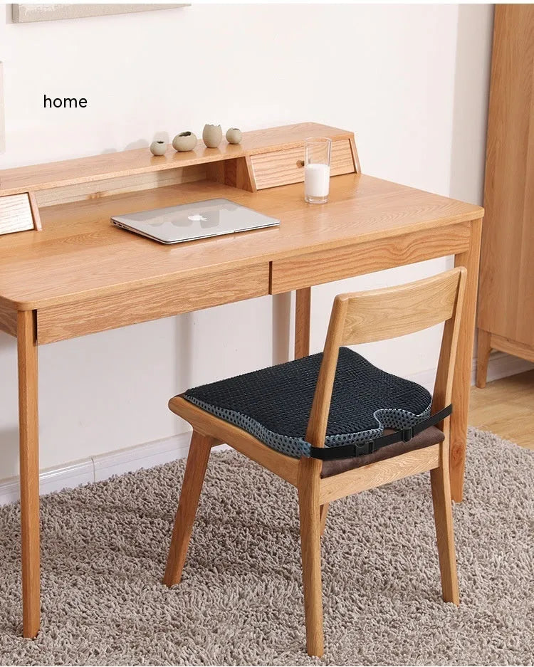 Regular size memory foam seat cushion with a fixed strap, shown in a solid colour.