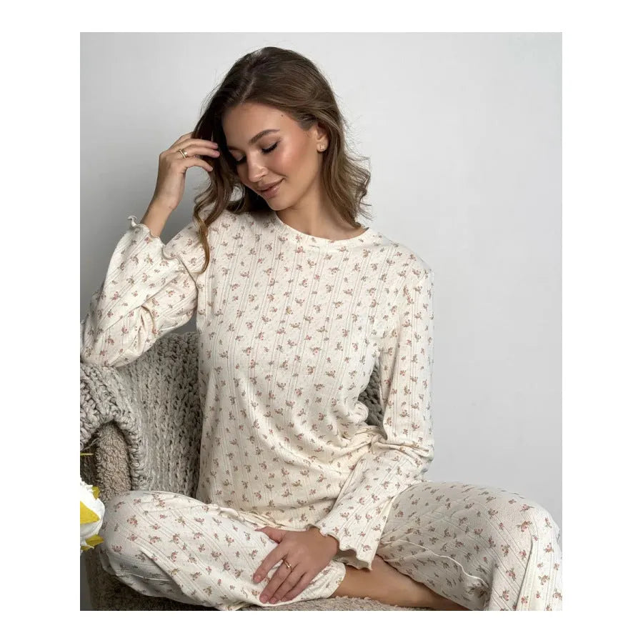 Women's white floral print two-piece suit with bell sleeve top and wide leg pants
