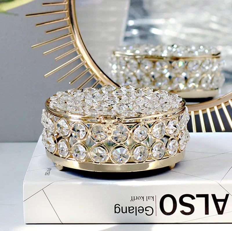 French gold iron frame transparent crystal glass jewelry storage box on a table