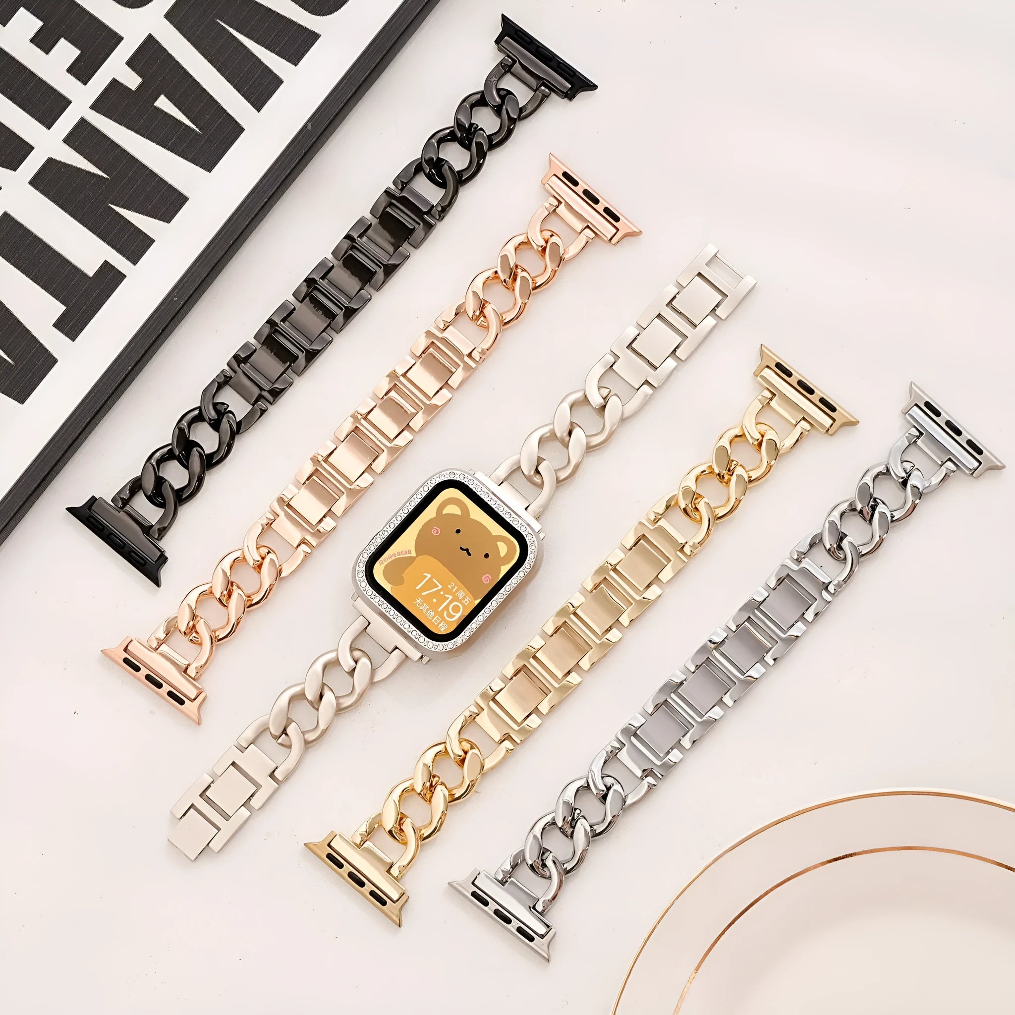 Metal denim chain Apple Watch strap in silver, black, gold, rose gold, and Starlight colours showing textured design