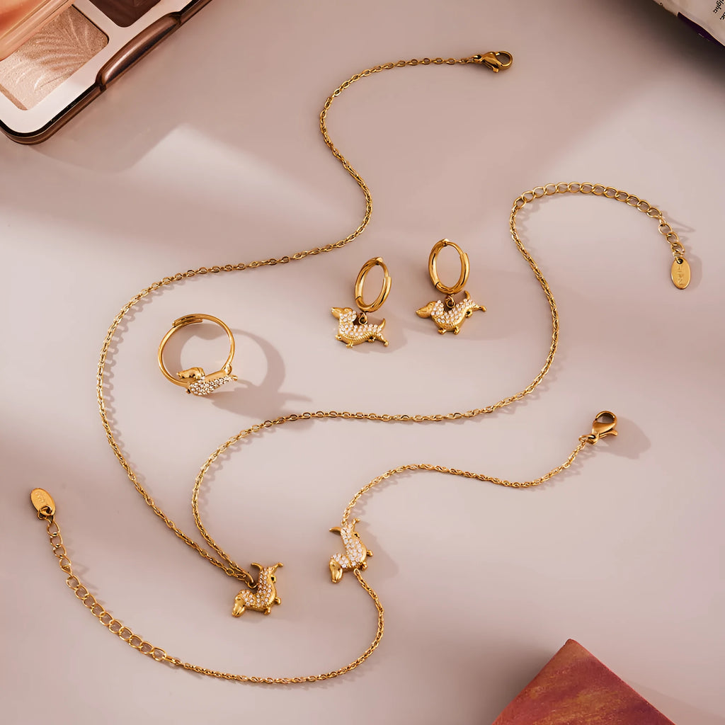 Gold puppy zircon bracelet with chain pattern and full zirconium accents on titanium steel