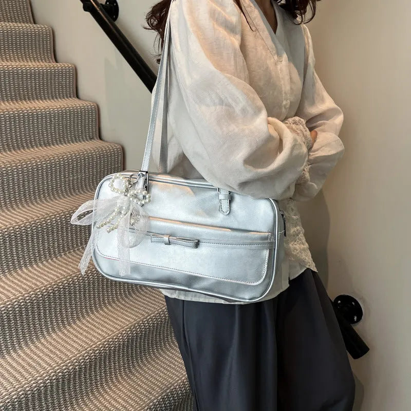 PU leather single shoulder flap bag in horizontal square shape with double straps and pearl bow decoration