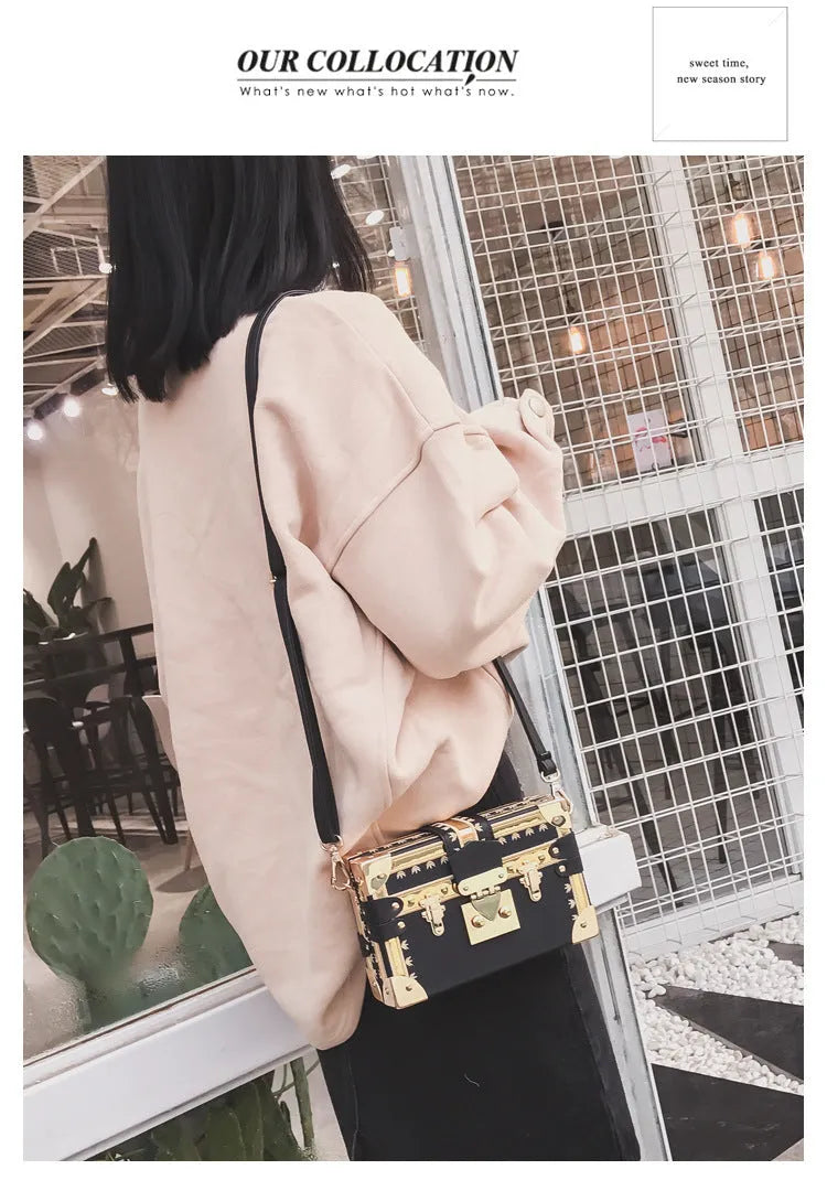 Structured hard PU women's shoulder bag with a flap, hasp closure, and adjustable strap.