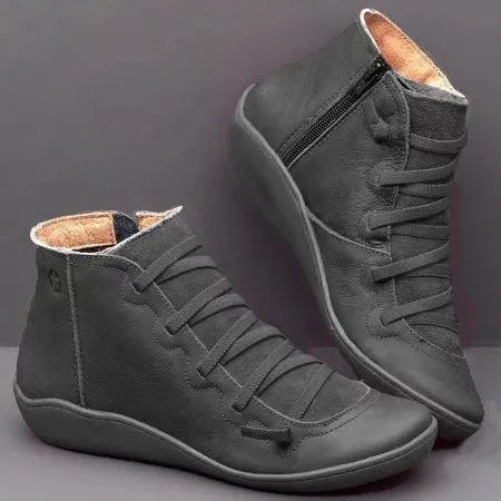 Women's casual flat booties with round toe and wedge heel in various colour options